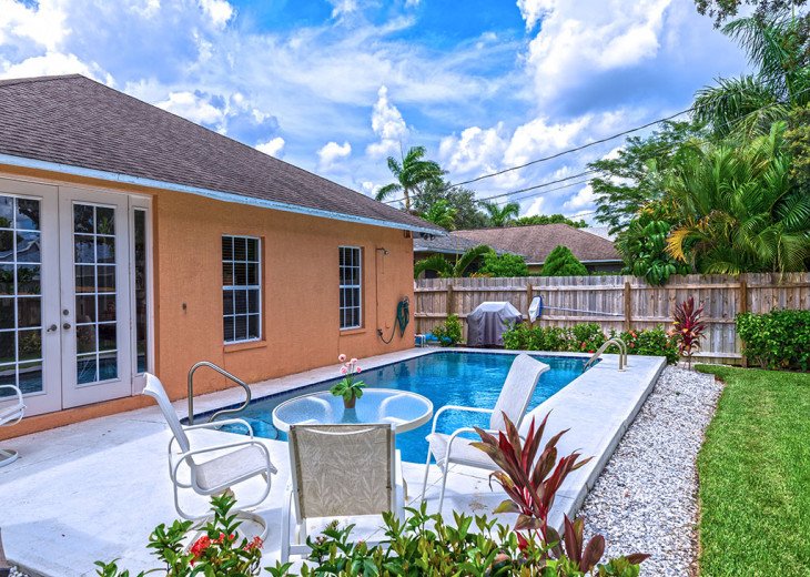 Outdoor heated pool, fenced yard and patio